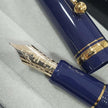Pilot Custom 74 Dark Blue GT Fountain Pen showcasing gold nib and dark blue barrel.