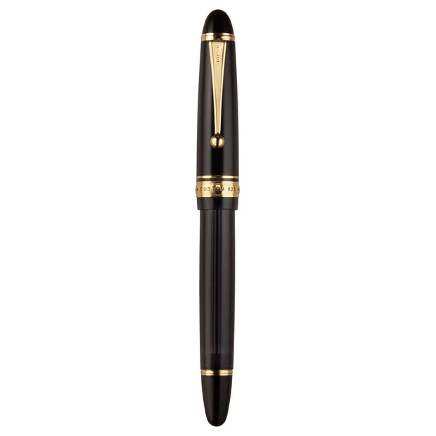 Pilot Custom 823 Black GT Fountain Pen in black with gold trims and elegant design.