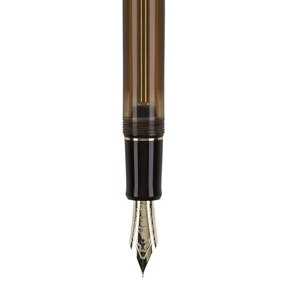 Pilot Custom 823 Amber Brown GT Fountain Pen nib and barrel with plunger filling mechanism.