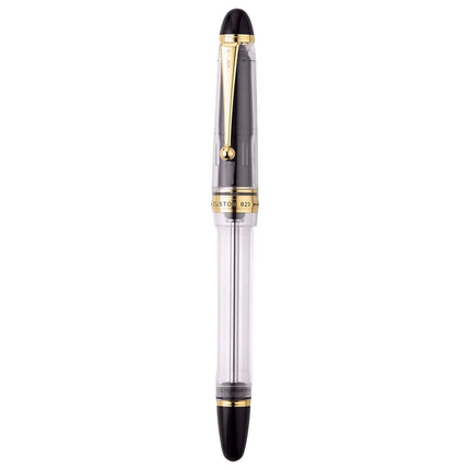 Pilot Custom 823 Clear GT Fountain Pen featuring a transparent barrel and gold trim for an elegant writing experience.