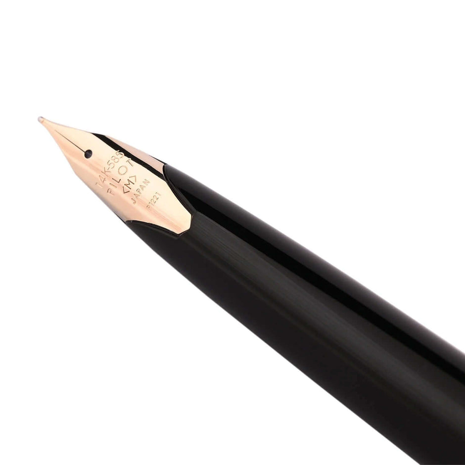 Close-up of the nib of a Pilot Elite 95s Black GT Fountain Pen, showcasing its premium craftsmanship.