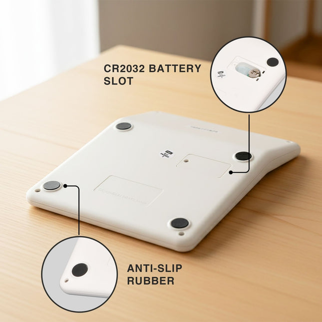 Flair FC-1090 14 Digits Desktop Calculator showing CR2032 battery slot and anti-slip rubber feet.
