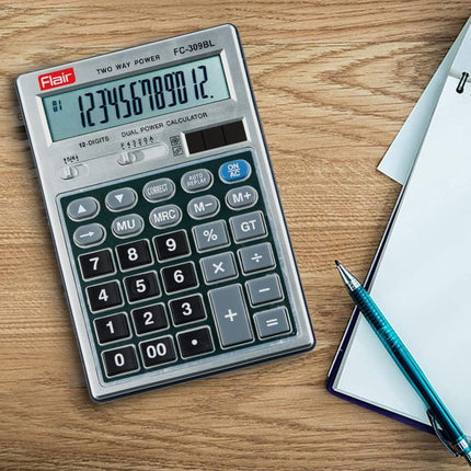 Flair FC-309BL 12 Digits Desktop Calculator on a wooden desk alongside a pen and notepad.