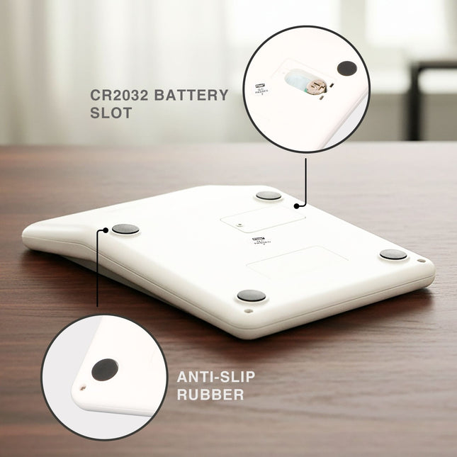 Flair FC-890 12 Digits Desktop Calculator rear view showing CR2032 battery slot and anti-slip rubber feet.