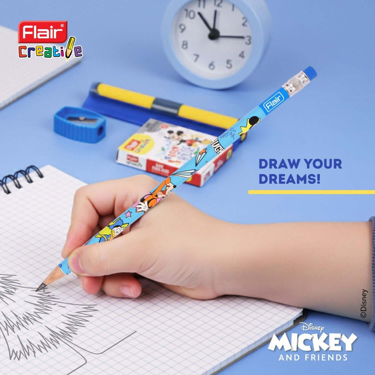 Flair Creative Disney Mickey 30 Kit | Stationery Kit of 4 Items with a colorful pencil being used on sketch paper.