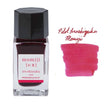 Pilot Iroshizuku Ink Bottle 15ML in Momiji color with swatch and label showcasing vibrant use for writing.