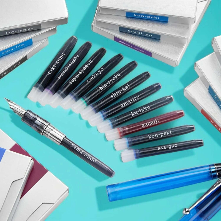 Pilot Iroshizuku Ink Cartridges IRF-6S for Fountain Pen | Pack of 6 displayed with various colors and fountain pens.