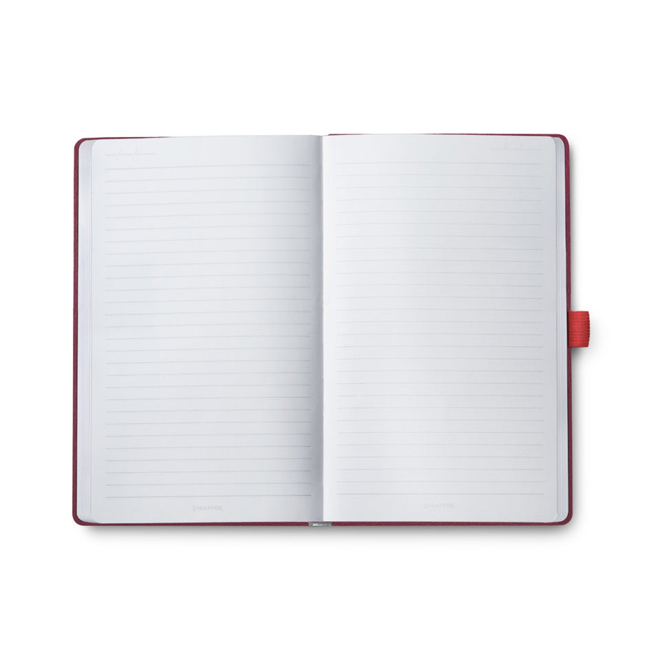 Open pages of Sheaffer Echoes Of Red 90GSM Notebook, featuring lined paper ready for writing.