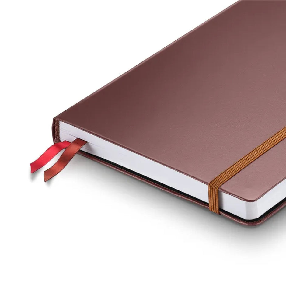 Sheaffer Echoes Of Red 90GSM Notebook with a dark brown hardbound cover and red ribbon bookmarks.