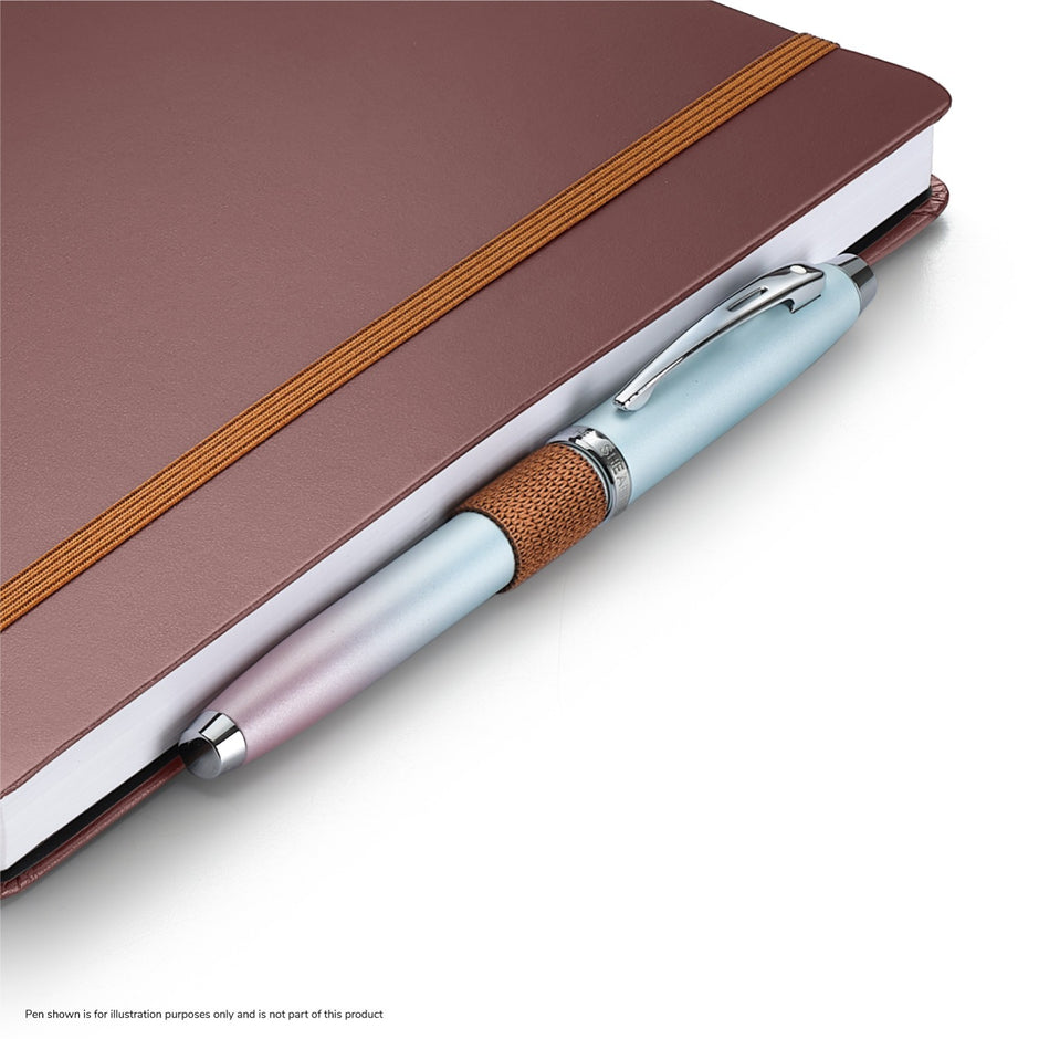 Sheaffer Echoes Of Red 90GSM Notebook with dark brown cover and stylish pen on top.