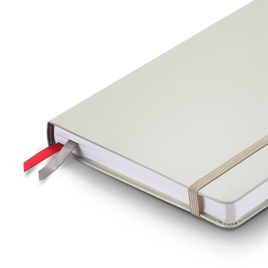 Sheaffer Nature's Muse 90GSM Notebook in light grey with red and grey ribbons for marking pages.