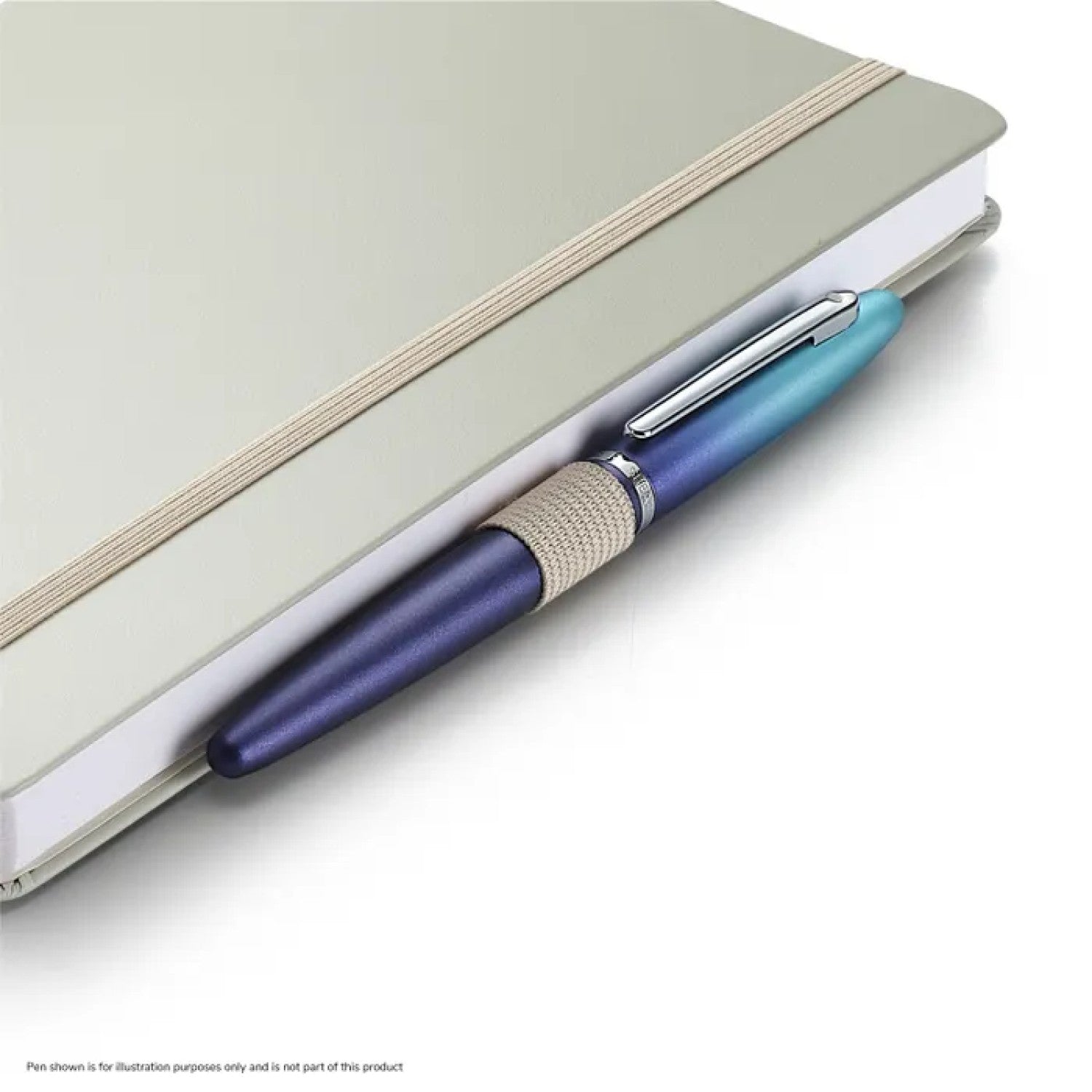 Sheaffer Nature's Muse 90GSM Notebook in light grey with a pen resting on the side, showcasing its elegant design.