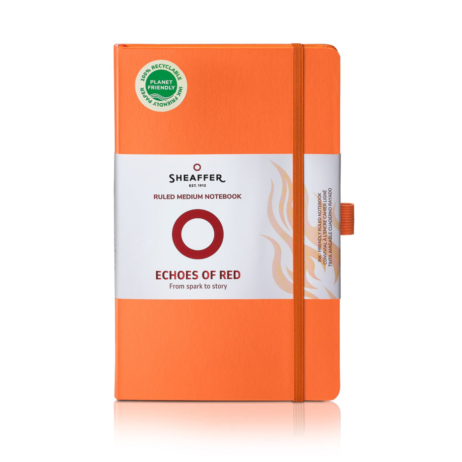 Sheaffer Echoes Of Red 90 GSM Notebook in orange with ruled pages and hardbound cover.