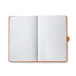 Sheaffer Echoes Of Red 90 GSM Notebook open pages displaying blank lined sheets.