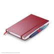 Sheaffer Echoes Of Red 90 GSM Notebook with red hardbound cover and pen beside it.