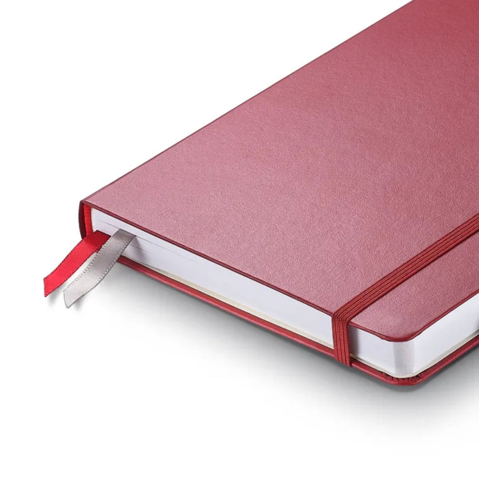 Sheaffer Echoes Of Red 90 GSM Notebook showing durable red hardbound cover and ribbon bookmark.