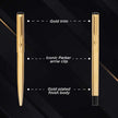 Parker Vector Gold Roller Ball Pen and Ball Pen with Card Holder, featuring gold trim and iconic Parker clip.