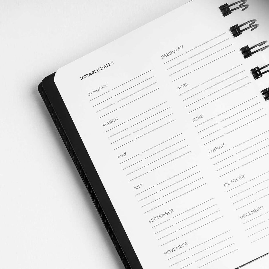 Parker Premium Wiro Note Book Silver with Black & Grey Tabs | 4 Subject | Size - 10.8cm x 14cm open pages showing notable dates layout.
