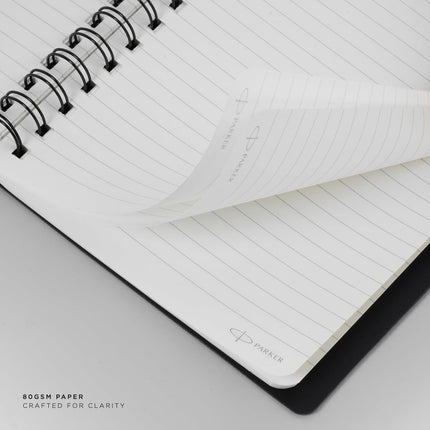 Parker Premium Wiro Note Book Gold with Ochre Tabs | 4 Subject | Size - 10.8cm x 14cm showcasing lined pages and spiral binding.