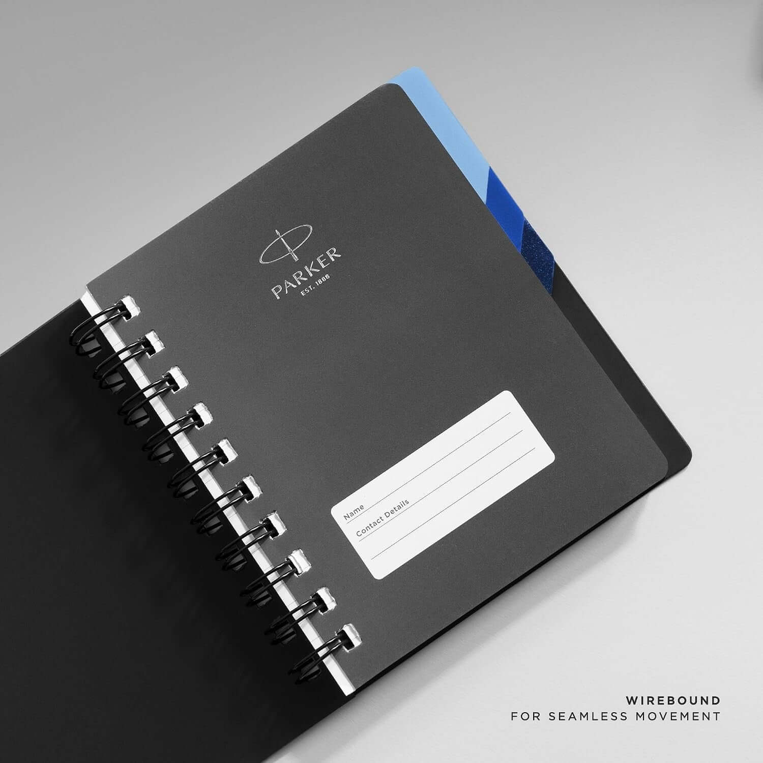 Parker Premium Wiro Note Book Silver with Blue Tabs | 4 Subject | Size - 10.8cm x 14cm open view showcasing wirebound design.