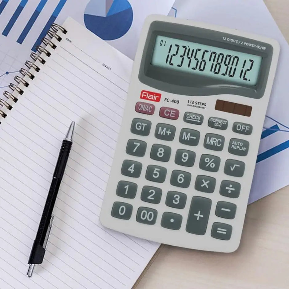 Flair FC-400 12 Digits Desktop Calculator on a desk with notebook and pen, showcasing its clear display and efficient design.