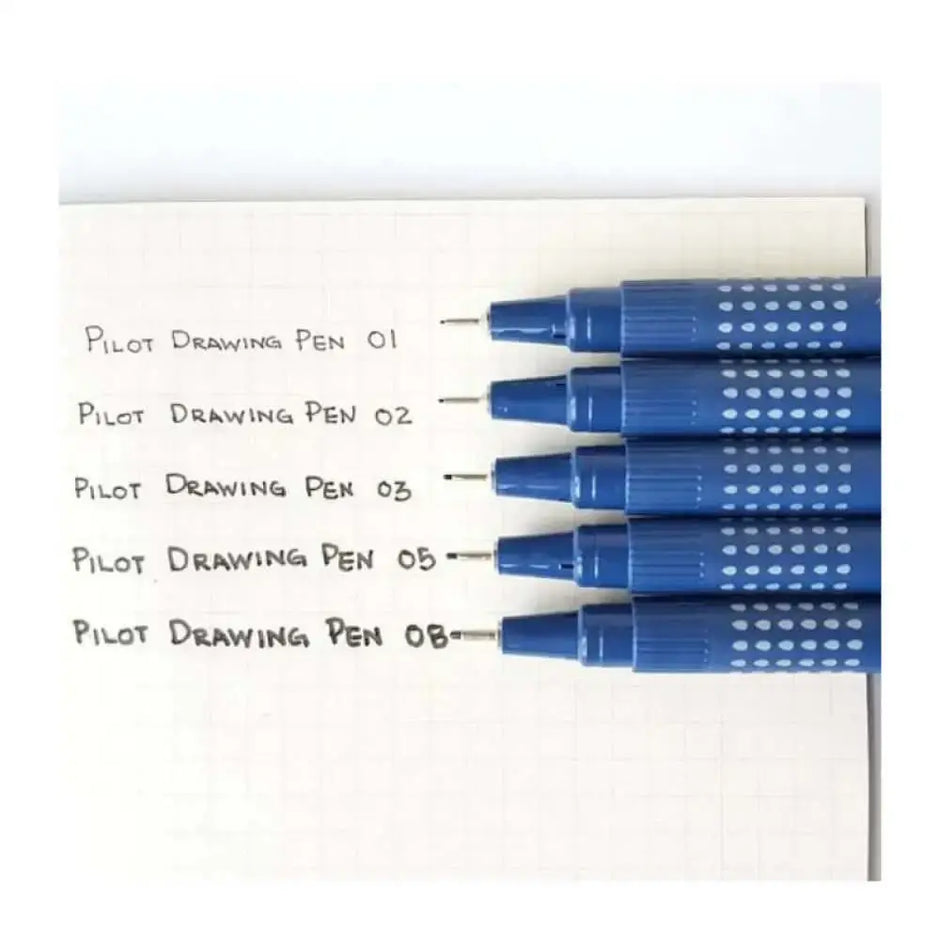 Pilot Drawing Pen Set of 5 displayed with different point sizes on a notepad, showcasing their vibrant ink.