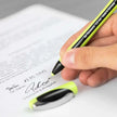 Schneider Xpress Fineliner 0.8 MM Pen signing a document with a hand, featuring a vibrant design.