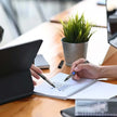 Schneider Xtra 805 0.5 MM Roller Ball Pen being used for note-taking and drawing on a notebook.